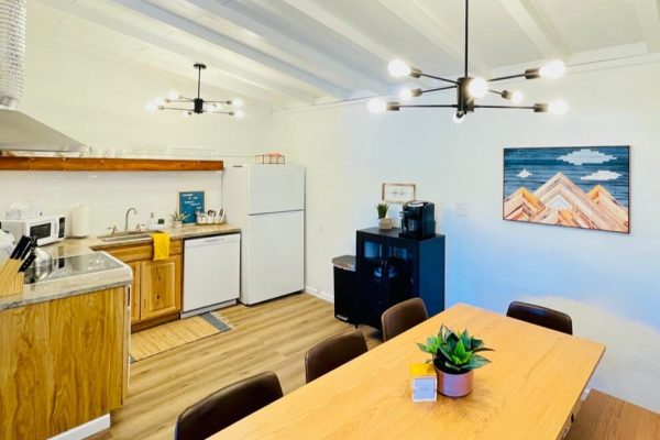 Fully loaded kitchen and dining area. Coffee bar with Keurig machine, coffee machine and French press.